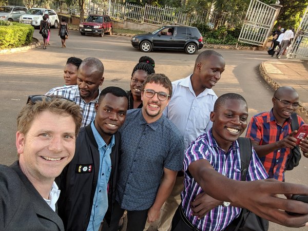 Group of people posing for a selfie