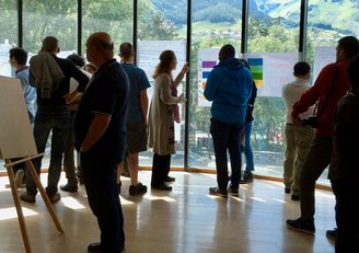 Participants of summer school discussing their findings 